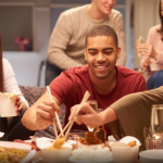 A group of friends enjoying a meal.